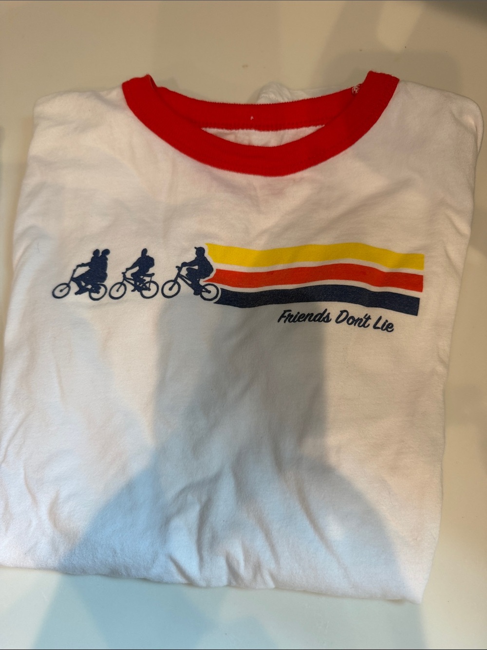 Netflix White Kids Graphic Tee with Red Neck Trim